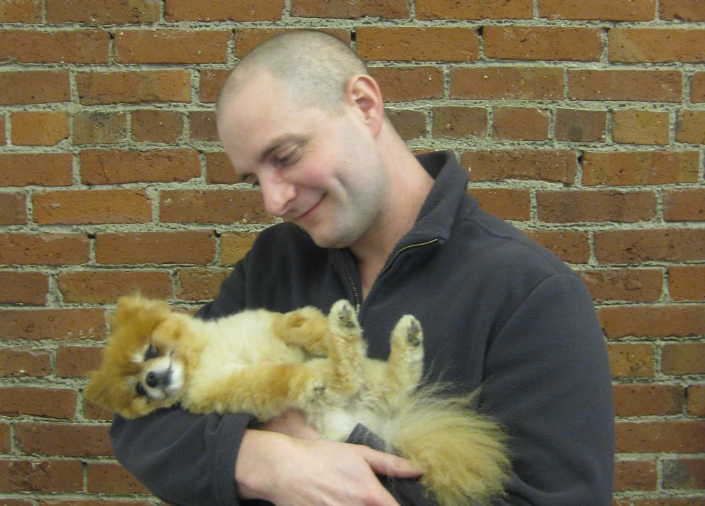 Aaron and his Pomeranian, Caramel